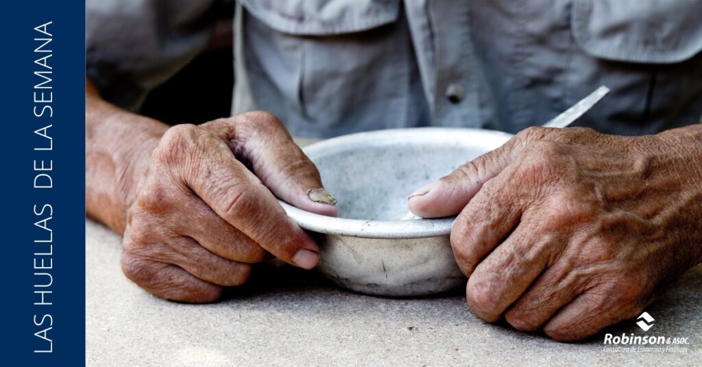 imagen que muestra unas manos sobre un plato vacío de comida que ilustra el indice de pobreza